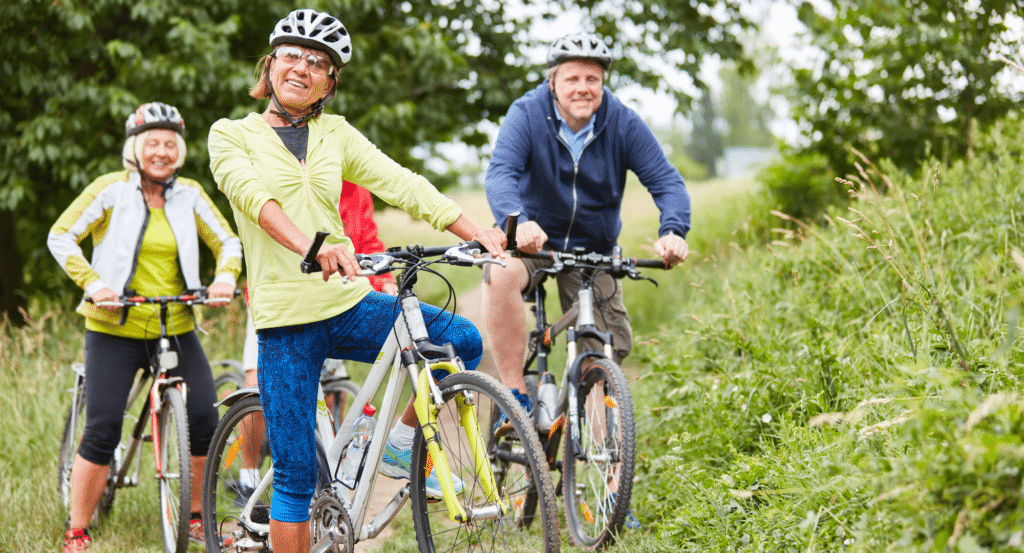 Group of 4 bike riders on a trail. These 4 bike riders can benefit from using Glympse Premium Tags.